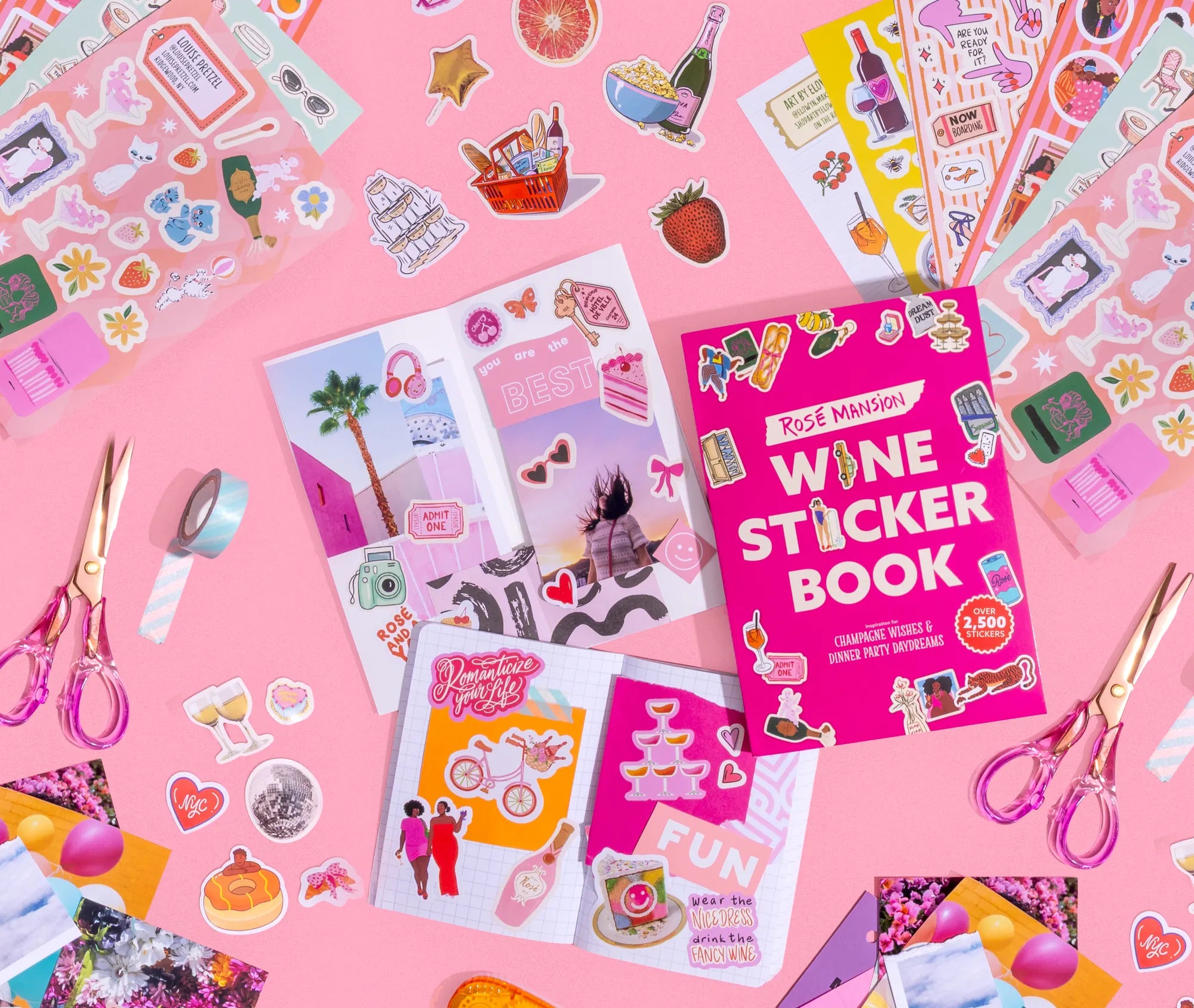 The Rosé Mansion Wine Sticker Book surrounded by sticker sheets, journals, and scissors